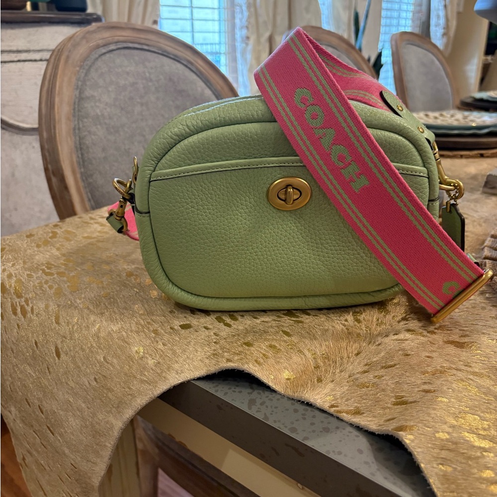 Coach Green Crossbody Bag with Pink Strap and green slim leather strap.